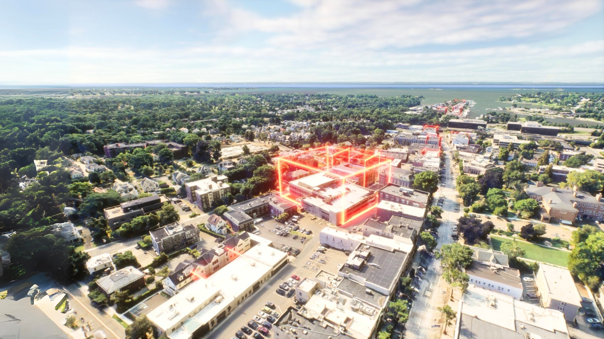Aerial view of a residential neighborhood with highlighted property boundaries, showing surrounding greenery, buildings, and amenities for a comprehensive understanding of the area.
